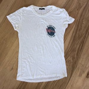 Brandy Melville “We grew Here you Flew Here” tee